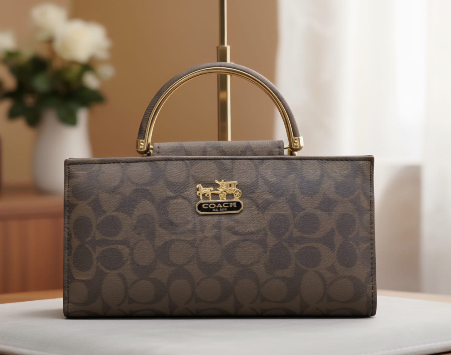 Elegant Red Coach Handbag with Signature Pattern